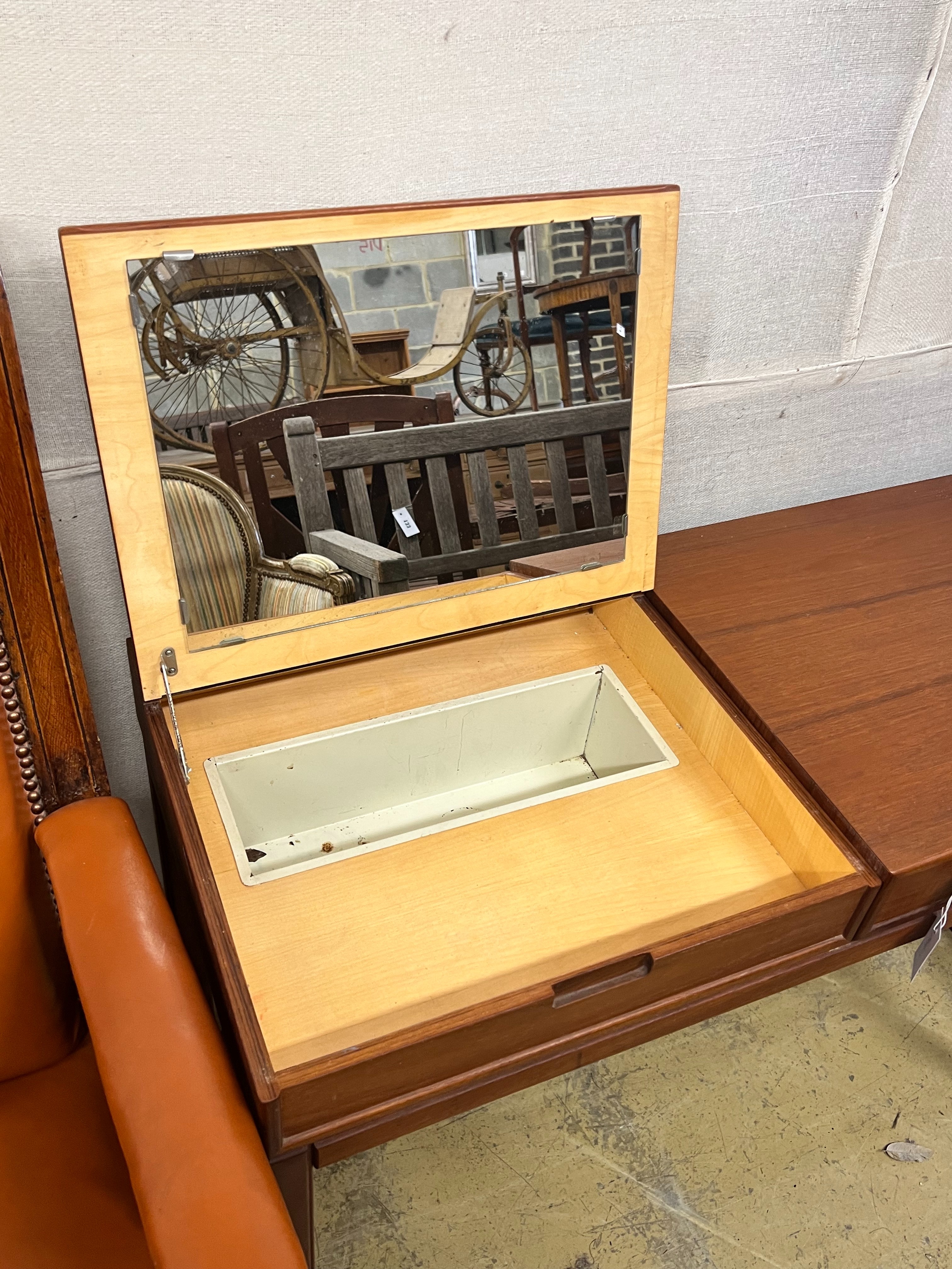 A mid century design teak dressing table, width 100cm depth 45cm height 72cm